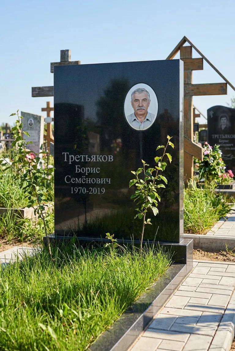 Современная гранитная стела на Домодедовском кладбище