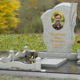 Гранитный монумент с драпировкой и волнообразным верхом - П147
